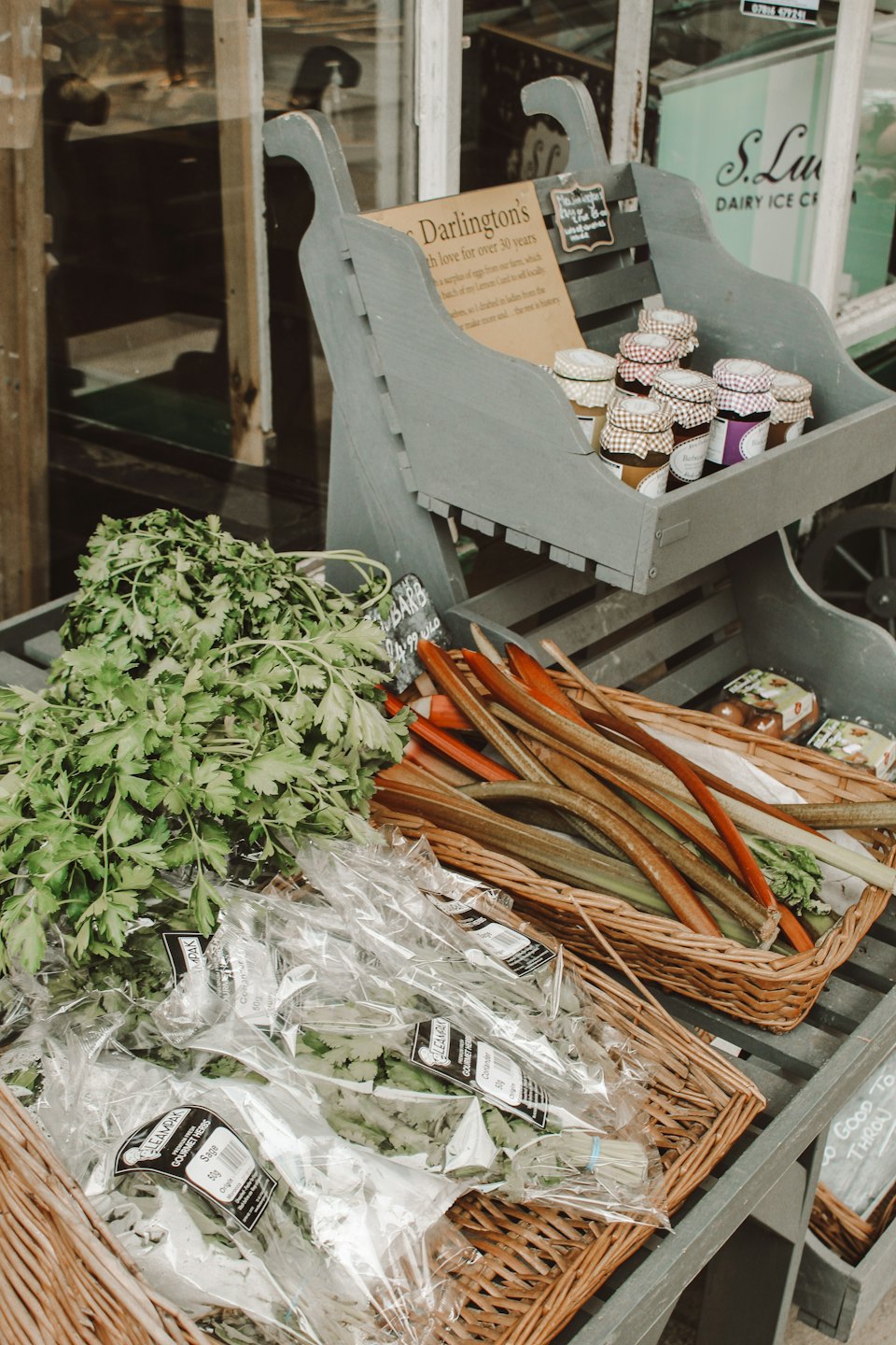 Farm stand with fresh produce and homemade preserves.